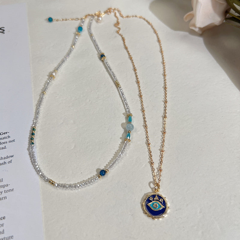 Two Stacked Necklaces With Natural Crystals